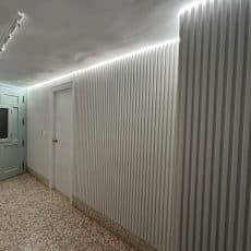 White Aspen slat wall with grey recosilent acoustic felt in basement